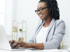 Ceo Writing Business Emails On Laptop In Office